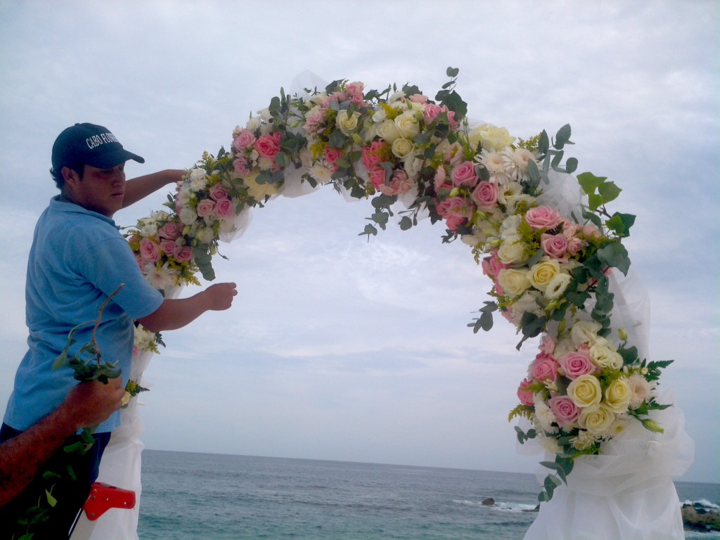 Designer Luis Fernando putting final touches on arch